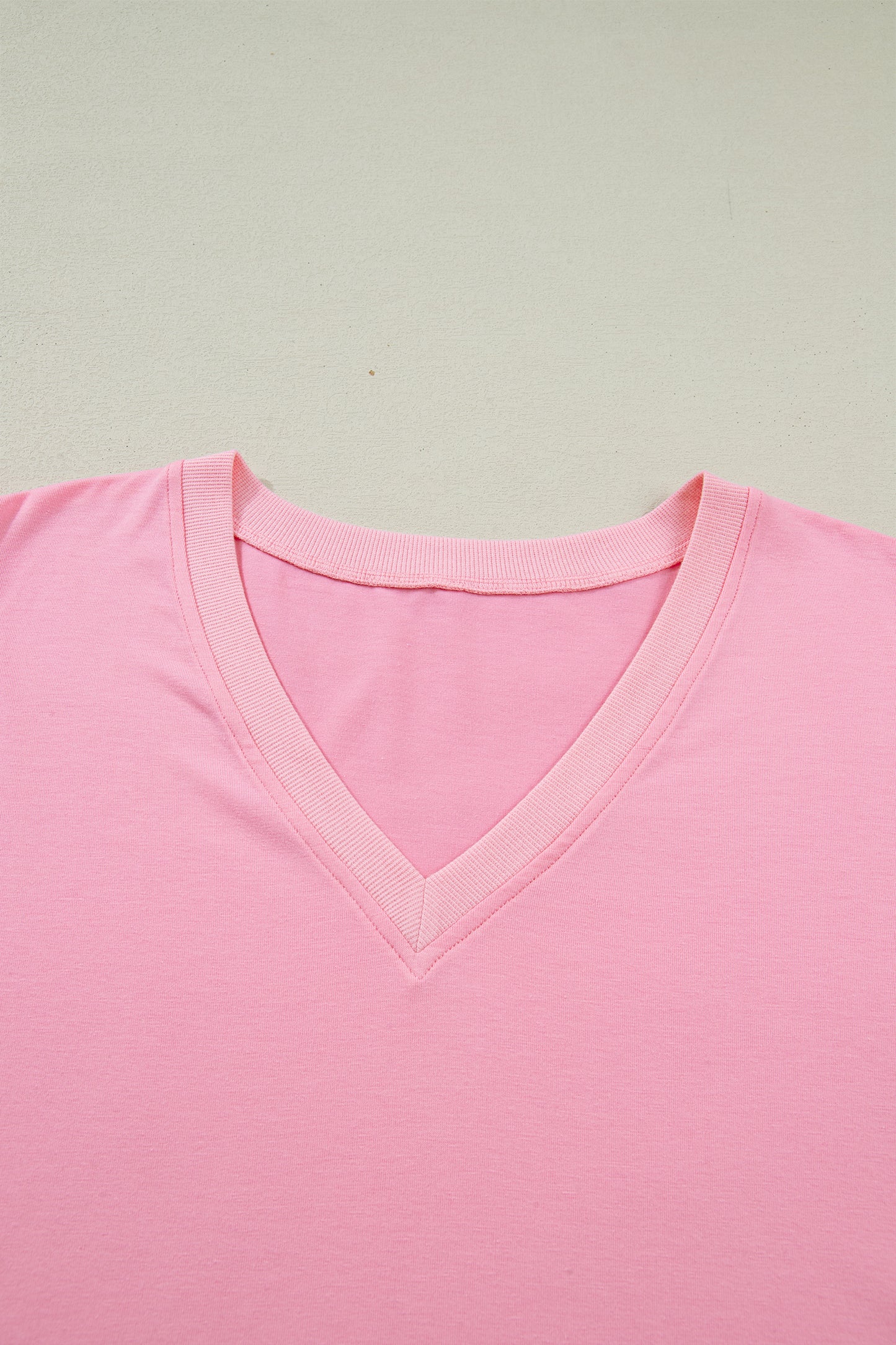Modern Grace plus size V-neck blouse with pleats and short puff sleeves, featuring a stylish, comfortable fit for curvy figures.
