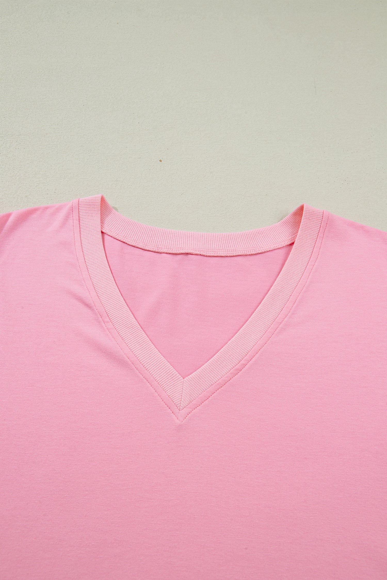 Modern Grace plus size V-neck blouse with pleats and short puff sleeves, featuring a stylish, comfortable fit for curvy figures.