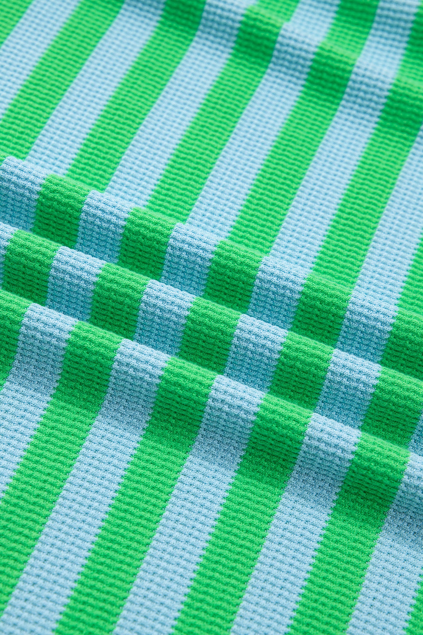 Green stripe puff sleeve T-shirt and matching shorts set by Modern Grace, stylish two-piece summer outfit.