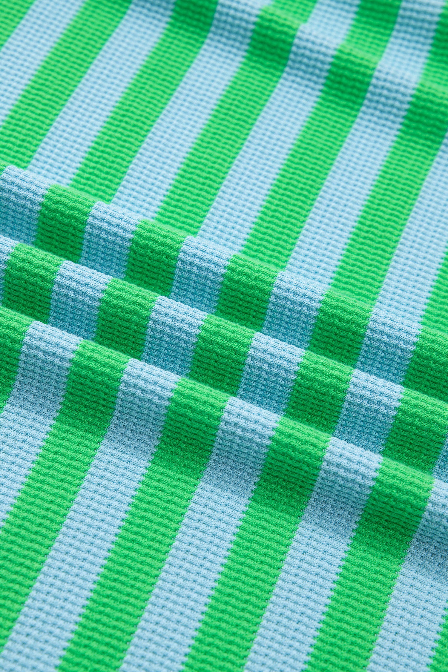 Green stripe puff sleeve T-shirt and matching shorts set by Modern Grace, stylish two-piece summer outfit.