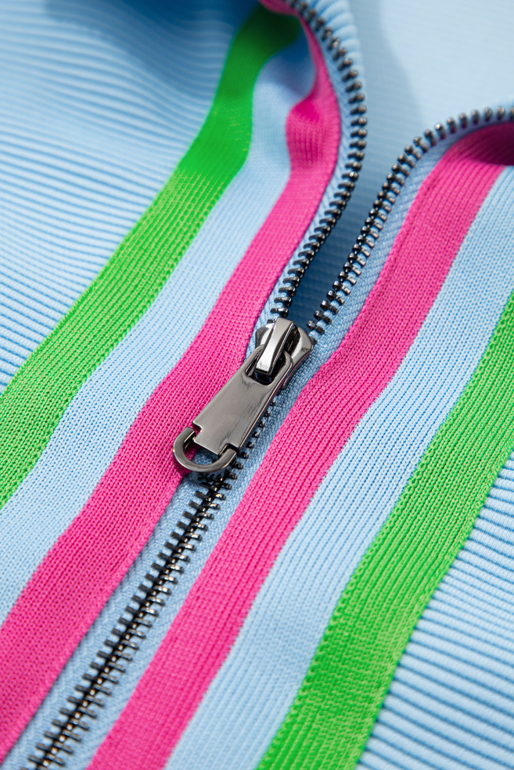 Modern Grace Beau Blue striped short set with flutter sleeves and zip-up collar, featuring a stylish two-piece design.