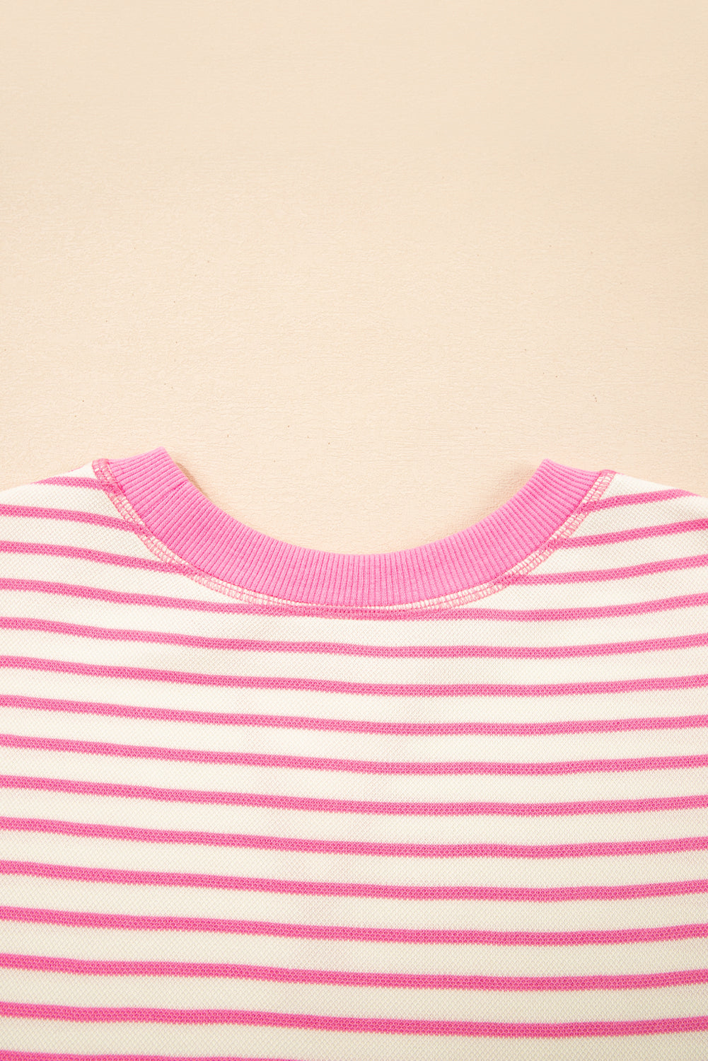 Pink striped ruffle short sleeve top with contrast detail from Modern Grace, casual and stylish women's blouse.