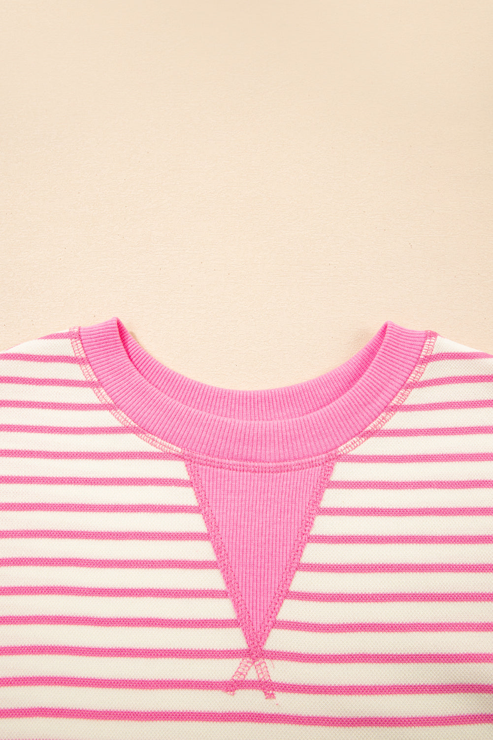 Pink striped ruffle short sleeve top with contrast detail from  Modern Grace, featuring a stylish and feminine design.