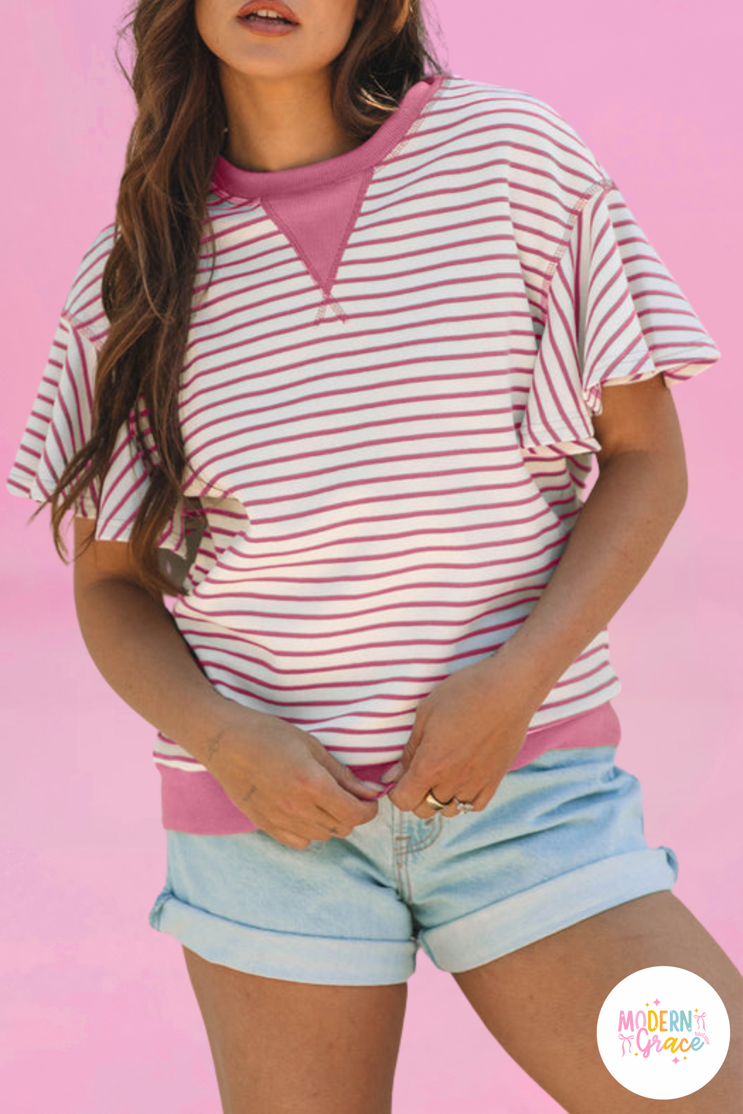 Pink striped ruffle short sleeve top with contrast detail by Modern Grace, featuring a stylish, feminine design.