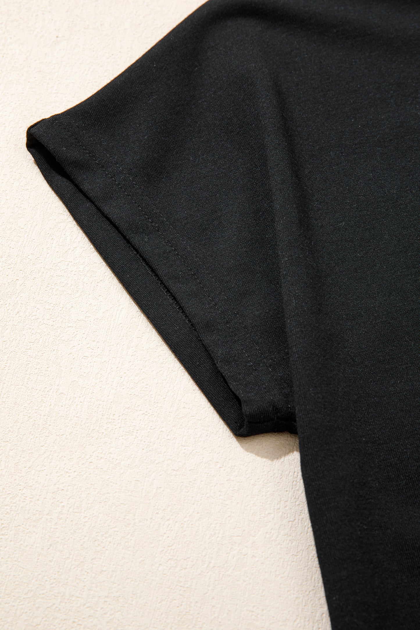 Black leopard print V-neck loose tee and drawstring shorts set by Modern Grace, casual two-piece outfit for relaxed wear.
