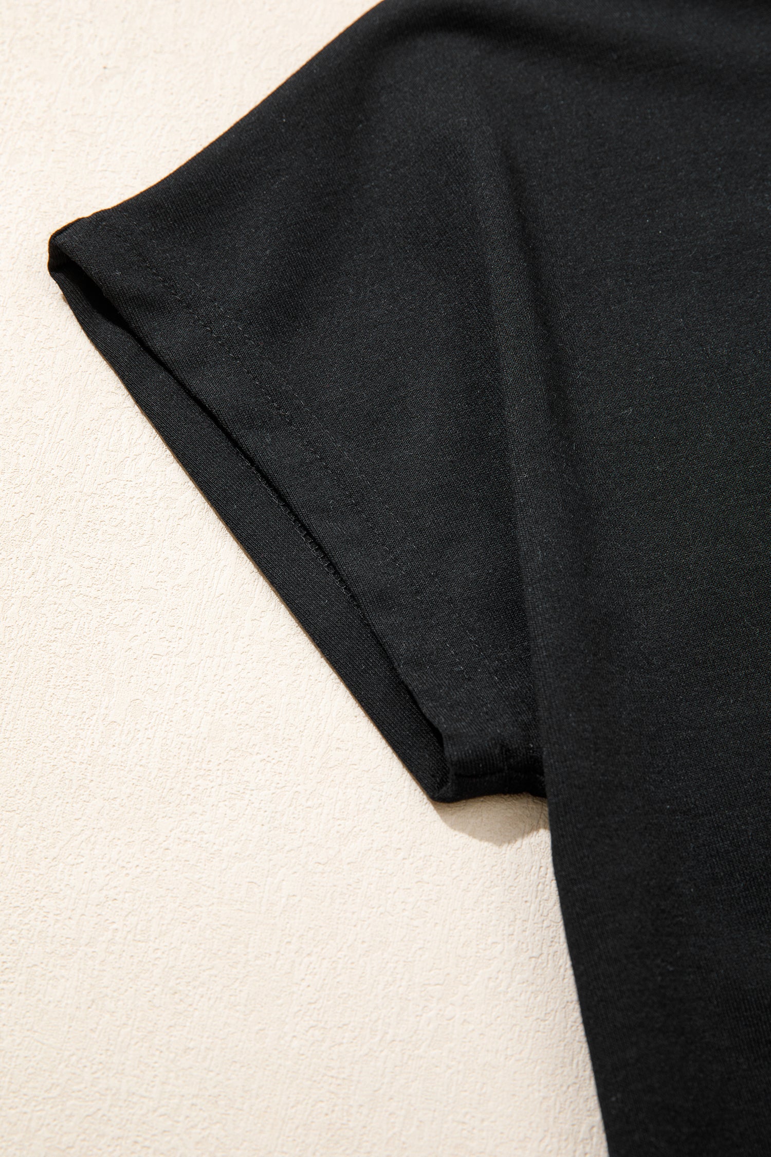 Black leopard print V-neck loose tee and drawstring shorts set by Modern Grace, casual two-piece outfit for relaxed wear.