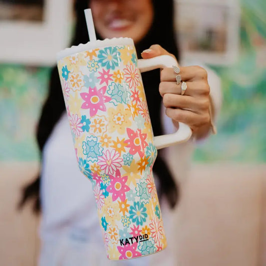 Modern Grace Spring Flowers 38 oz insulated stainless steel tumbler with a vibrant floral design for accessories.