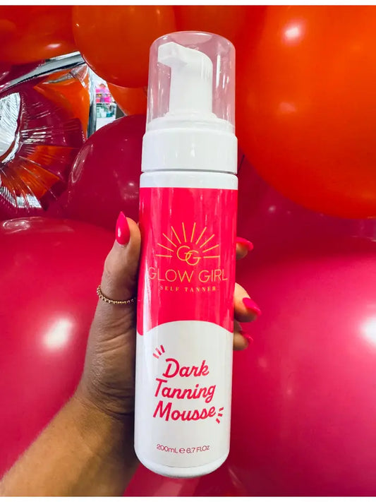 Glow Girl Ultra Dark Tanning Mousse in a pump bottle, showcasing smooth, foamy self-tanner for a deep, natural bronze glow.