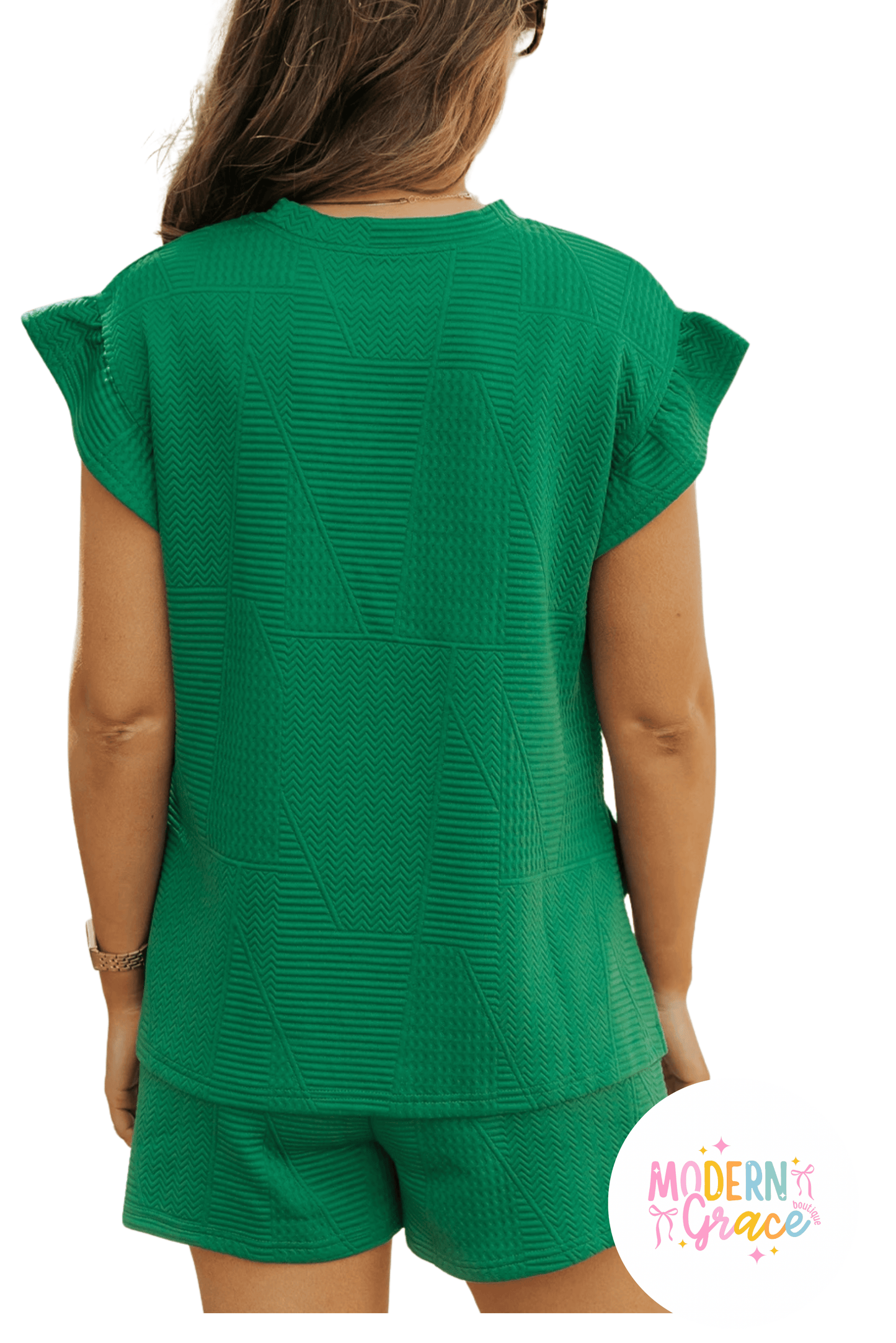 Dark green textured ruffle split top and drawstring shorts set by Modern Grace, featuring a stylish two-piece design.