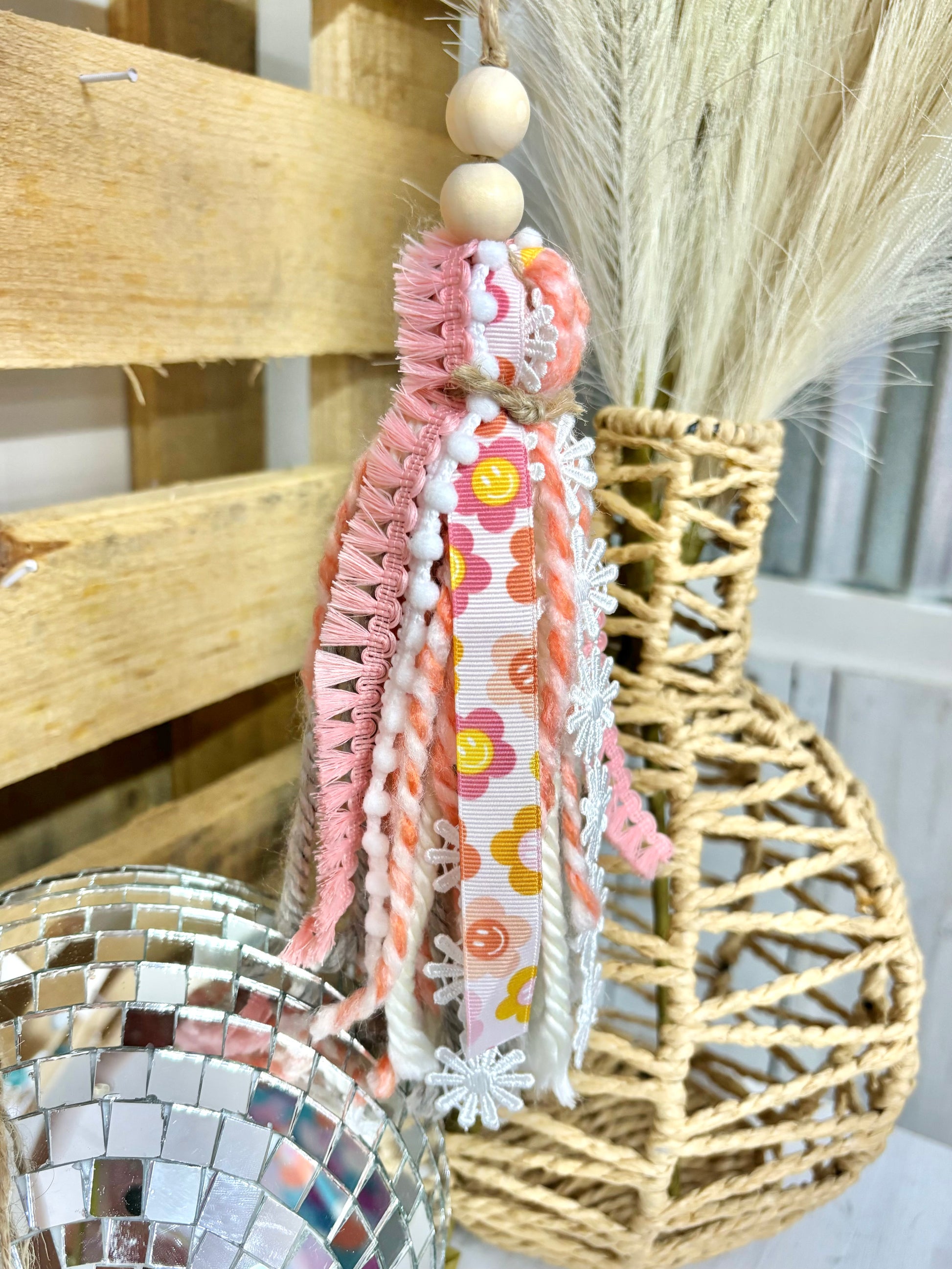 Handmade Harper Grace Design Bible tassel in tan checkered fabric, can be used as a car charm or bag accessory.