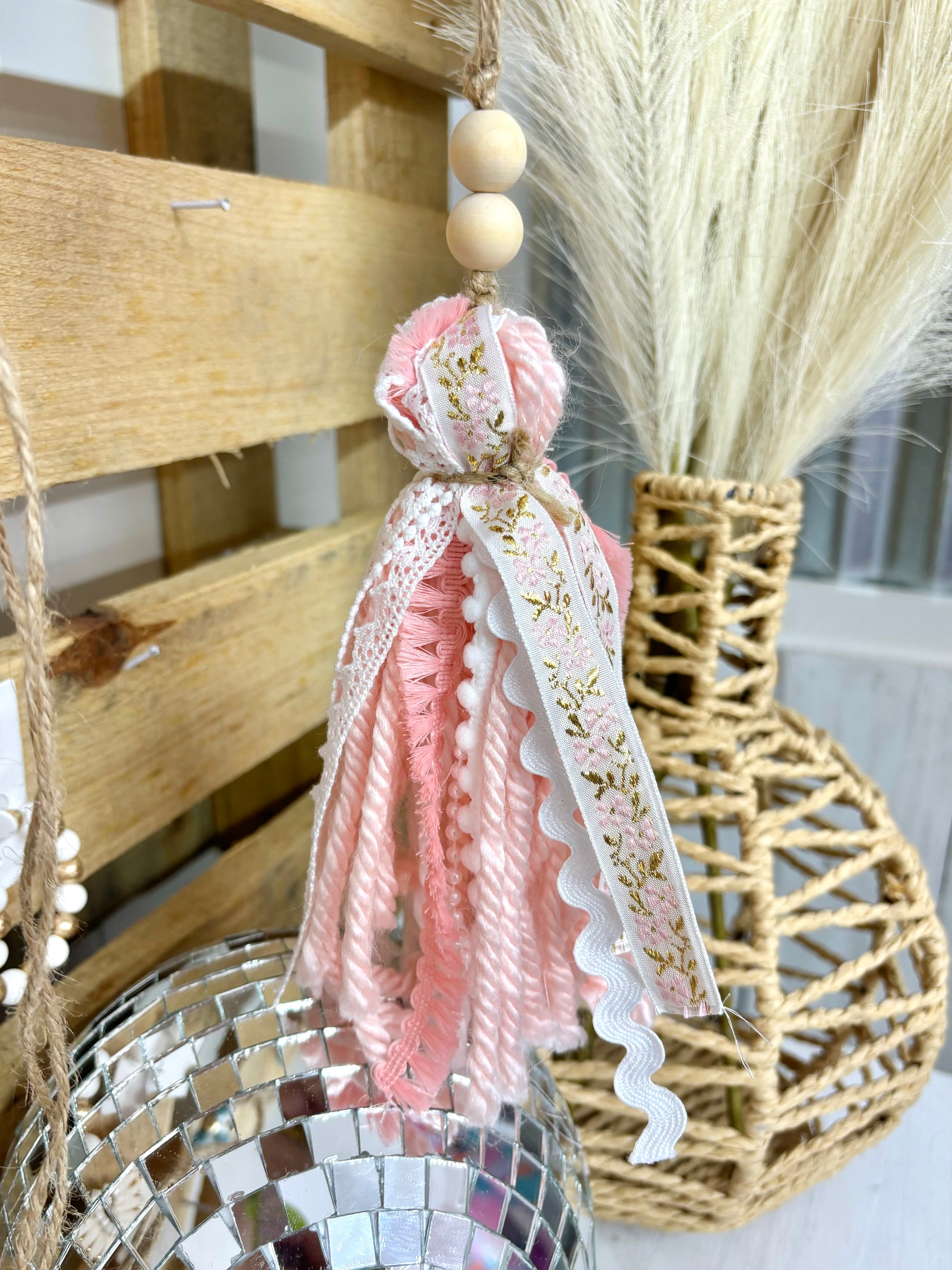 Handmade Harper Grace Design Bible tassel in tan checkered fabric, versatile as a car charm or Bogg bag accessory.