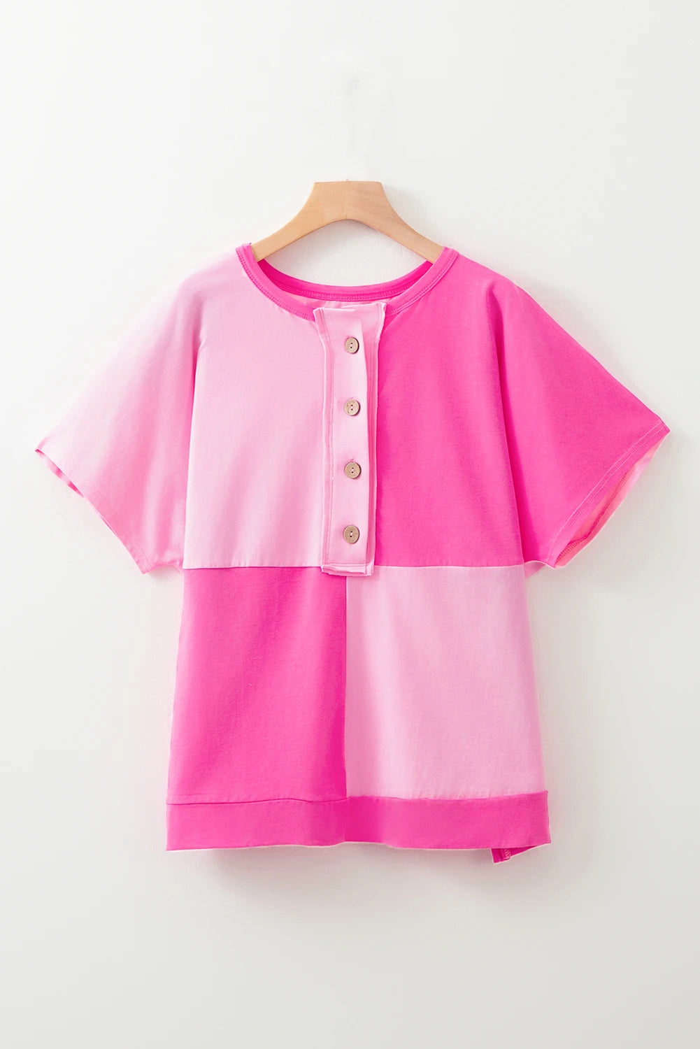 Bright pink colorblock patchwork short sleeve Henley top by Modern Grace with buttons and a curvy fit.