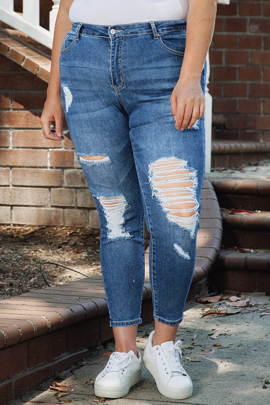 Modern Grace curved distressed ripped skinny jeans with a fitted style and frayed details, showcasing a trendy denim look.