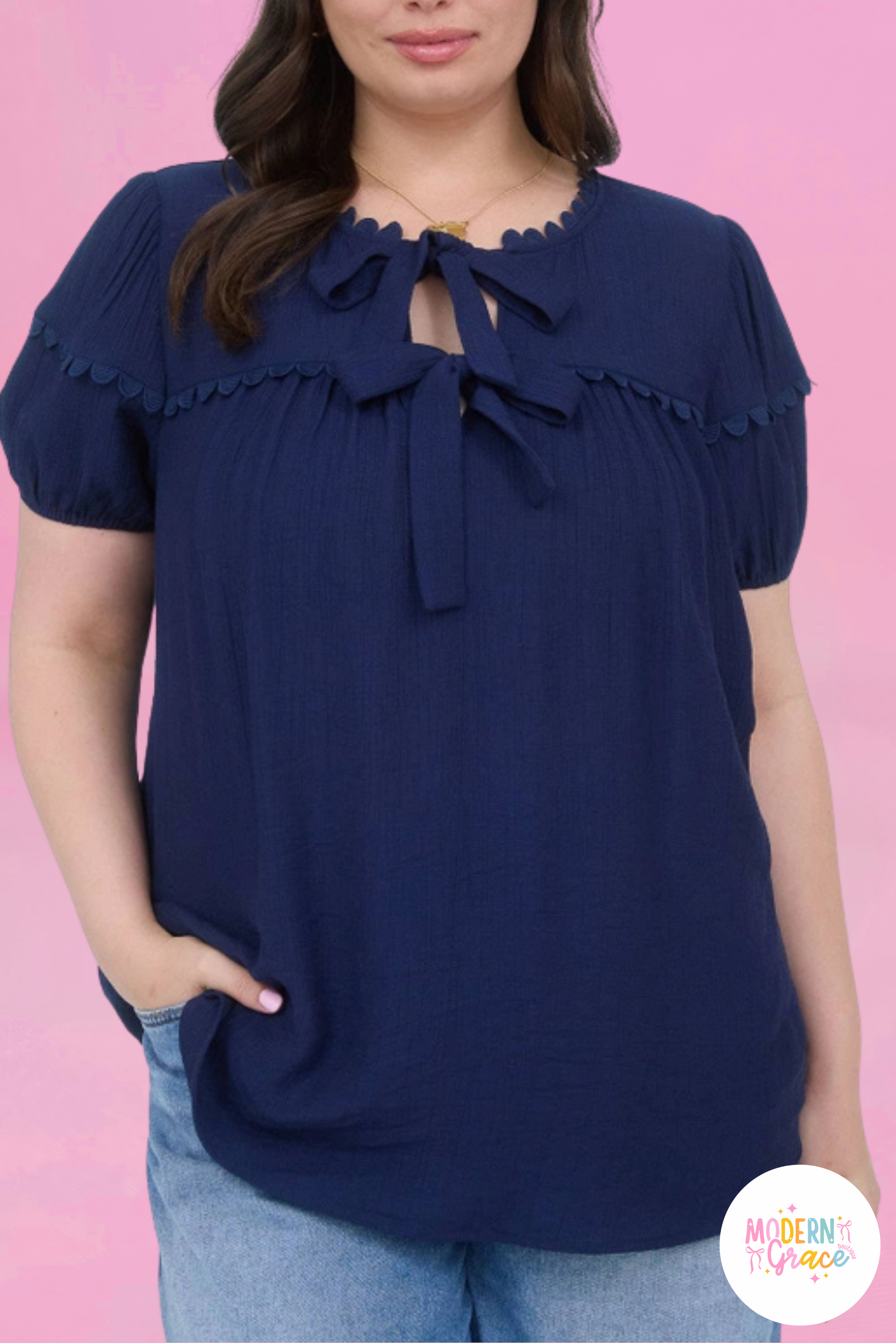 Curvy navy blue scallop trim bow blouse by Modern Grace, featuring a stylish scalloped neckline and feminine bow detail.