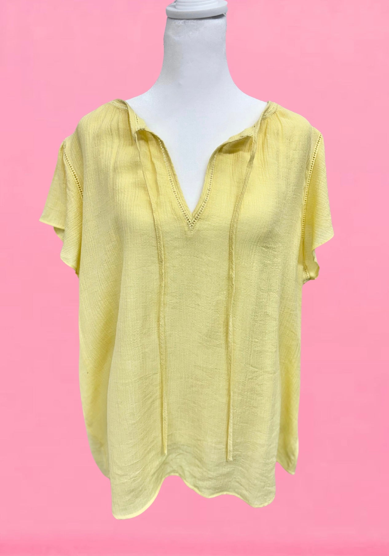Yellow CURVY flutter sleeve top by Modern Grace with a relaxed fit and stylish flutter sleeves on a white background.