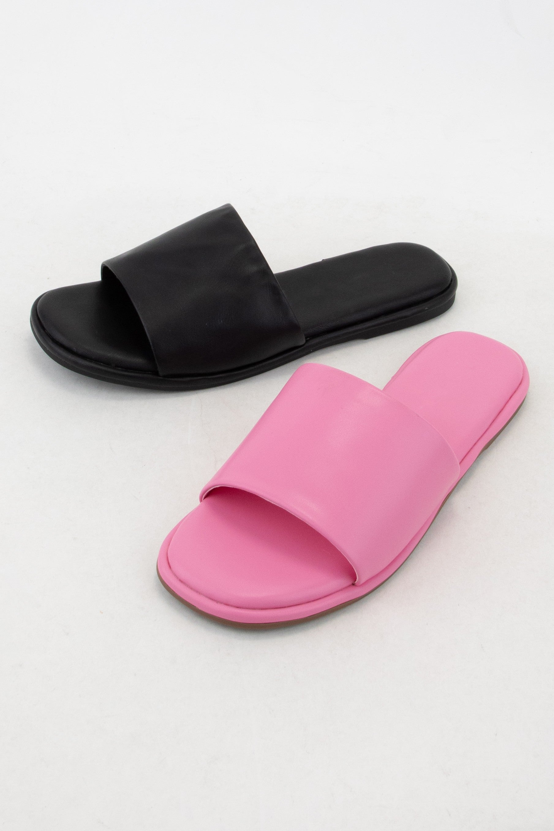 Pink padded sole slides by Modern Grace with cushioned footbed and open-toe design for comfortable casual wear.