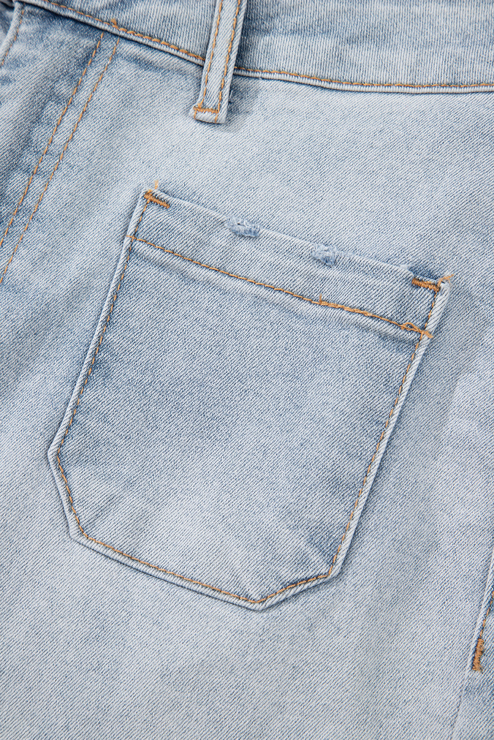Modern Grace Beau Blue Light Wash High Rise Denim Shorts showing front view, with belt loops and rolled cuffs.