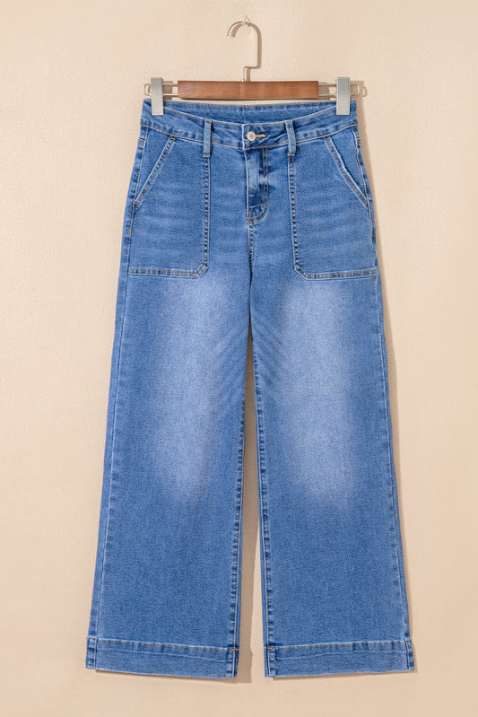 Sky blue cropped high-rise wide-leg jeans by Modern Grace, featuring a relaxed fit and denim fabric.