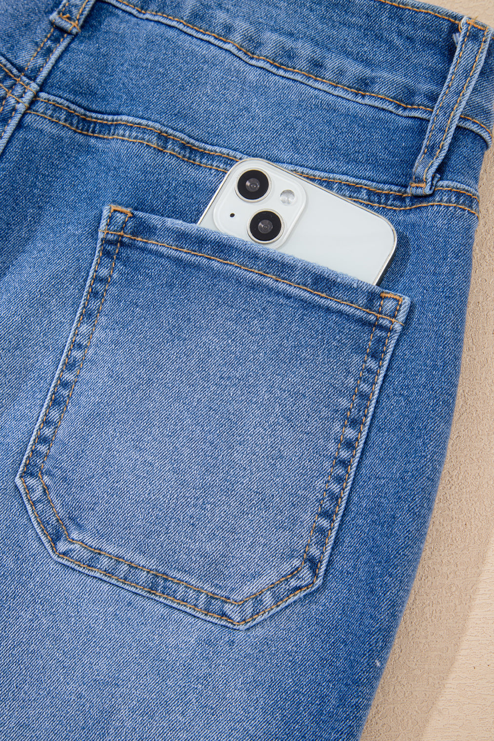 Sky blue cropped high-rise wide-leg jeans by Modern Grace, featuring a relaxed fit and durable denim for a stylish look.