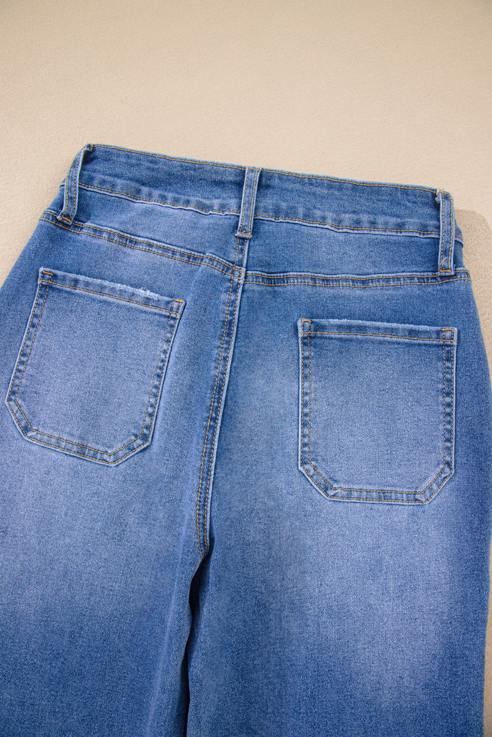 Sky blue cropped high-rise wide-leg jeans by Modern Grace, made of cotton, polyester, and elastane, with a relaxed fit.