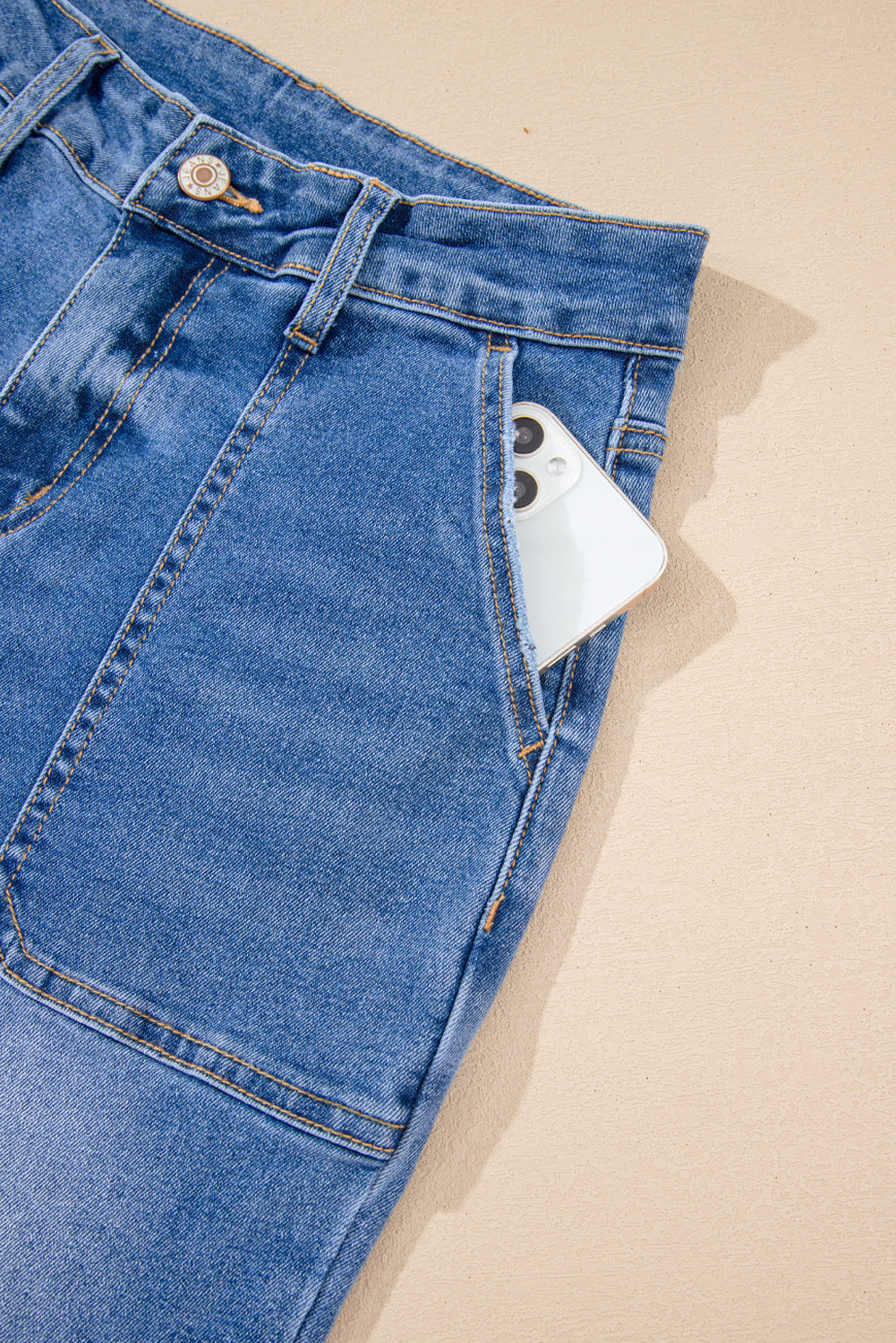 Sky blue cropped high-rise wide-leg jeans by Modern Grace, featuring a relaxed fit and trendy style.
