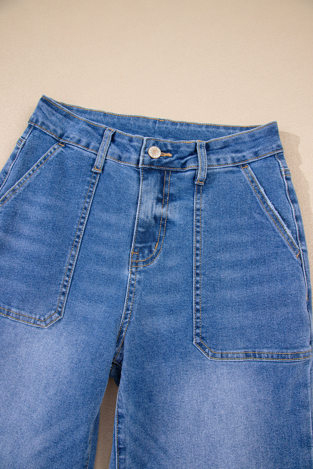 Sky blue cropped high-rise wide-leg jeans by Modern Grace, featuring a stylish relaxed fit and classic denim texture.