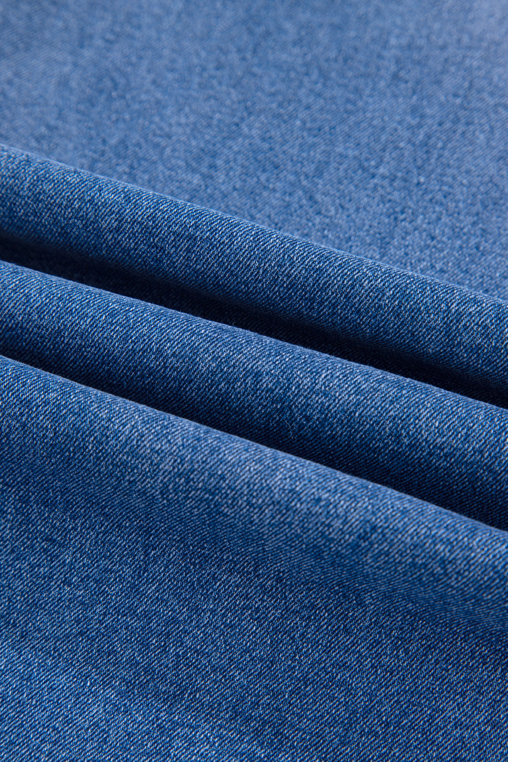 Sky blue cropped high-rise wide-leg jeans by Modern Grace, featuring a relaxed fit and stylish design.