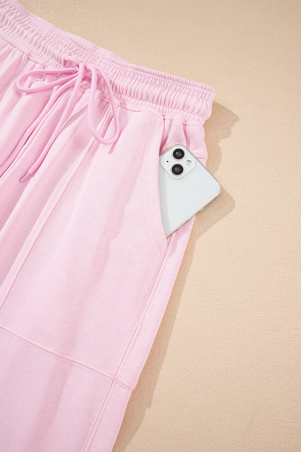 Light pink drawstring waist patchwork jogger pants by Modern Grace, casual cotton-polyester bottoms with a relaxed fit.