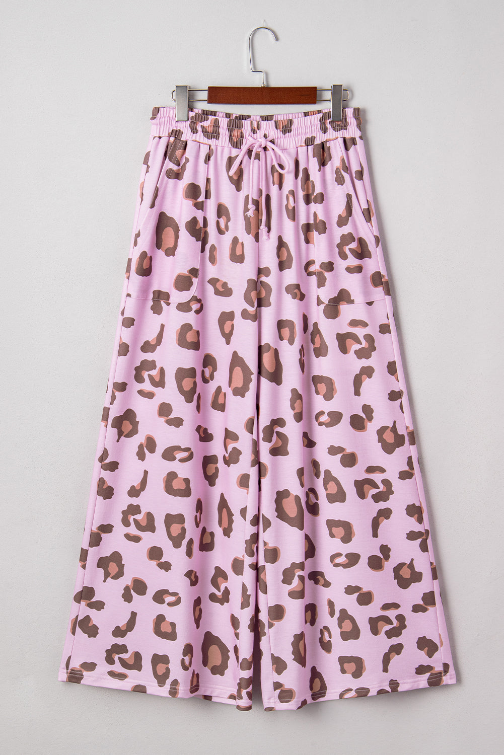 Pink leopard print drawstring pants by Modern Grace, casual bottoms with elastic waistband and lightweight polyester fabric.