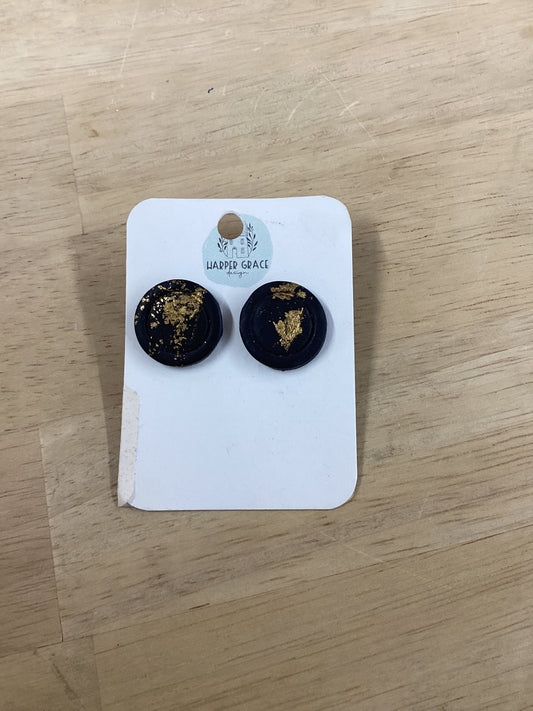 Black and gold button earrings by Modern Grace featuring sleek, round design with polished gold accents.