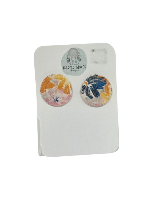Modern Grace floral button earrings featuring vibrant, colorful flower designs on round metal studs for a stylish accessory.