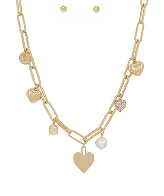 Modern Grace Heart and multi charm necklace set featuring layered gold-tone necklaces with various pendant designs.