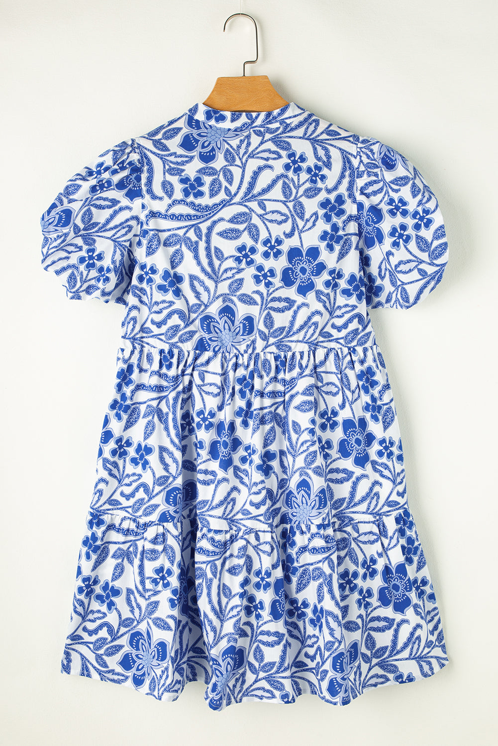 Blue flower print puff sleeve tiered dress by Modern Grace featuring a flowy silhouette and floral pattern.
