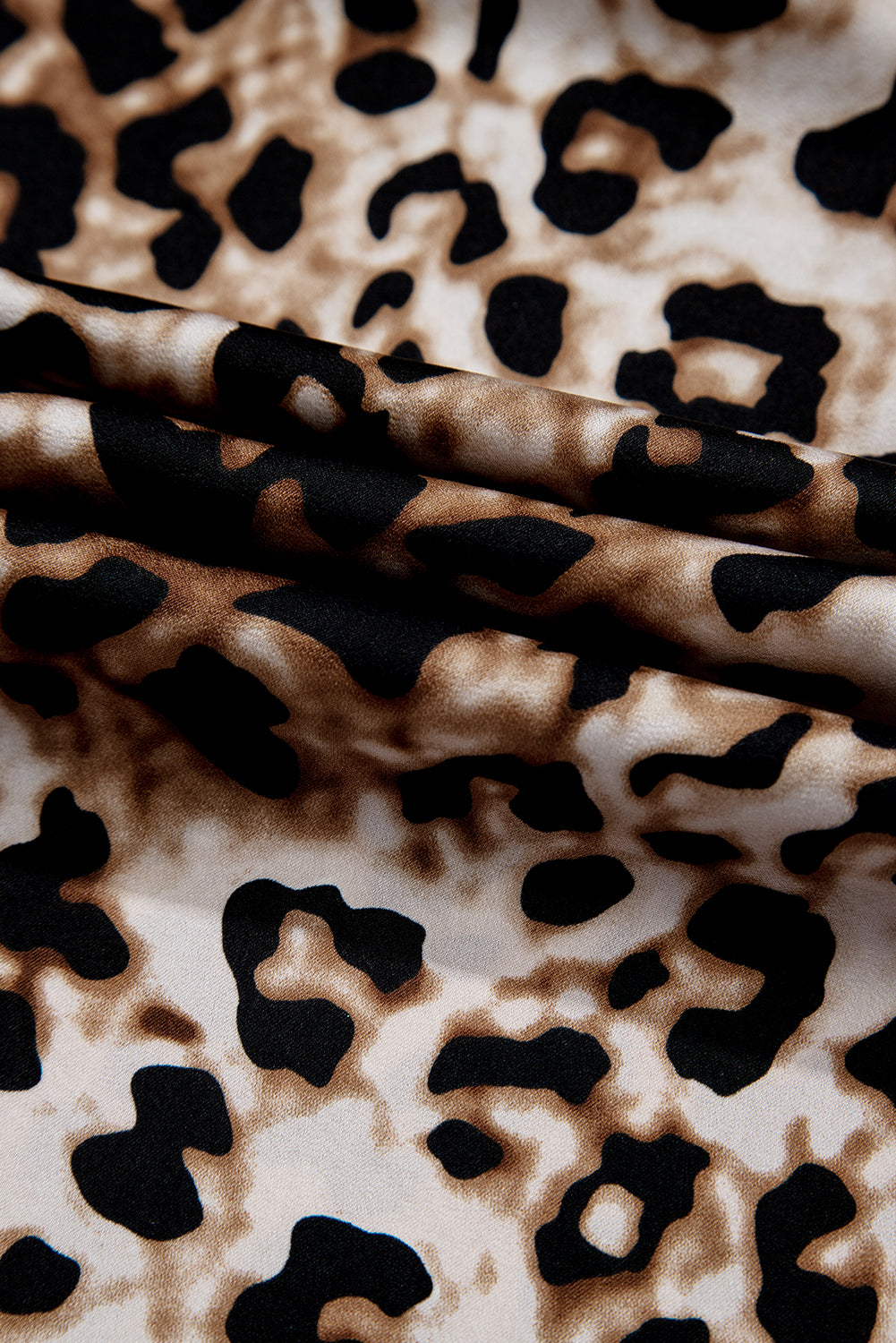 Brown leopard print bubble sleeve square neck maxi dress by Modern Grace, featuring a fitted waist and flowing skirt.
