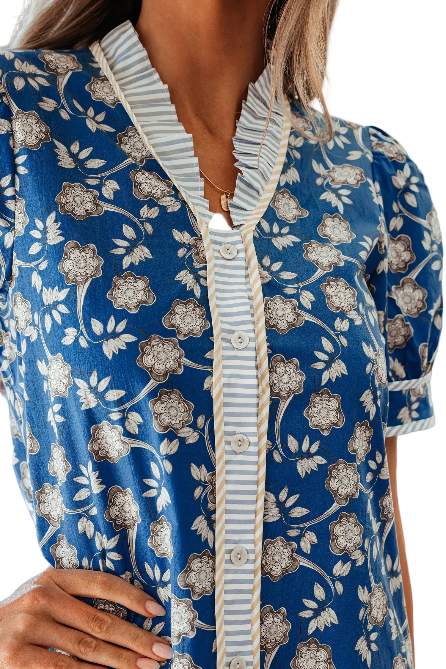 Blue striped trim floral dress by Modern Grace featuring half buttons, short sleeves, and a lightweight cotton fabric.