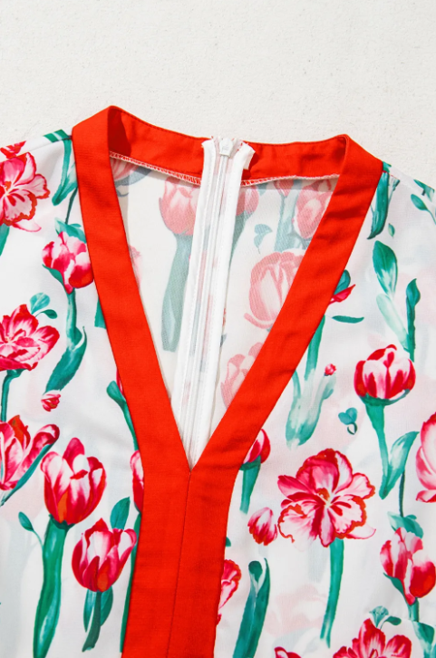Pink floral print contrast trim V-neck bubble babydoll dress by Modern Grace with short sleeves, polyester fabric, and feminine style.