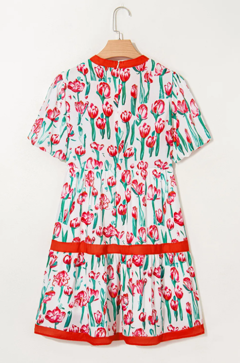 Pink floral print contrast trim V-neck bubble short sleeve babydoll dress by Modern Grace, with floral pattern and short sleeves.