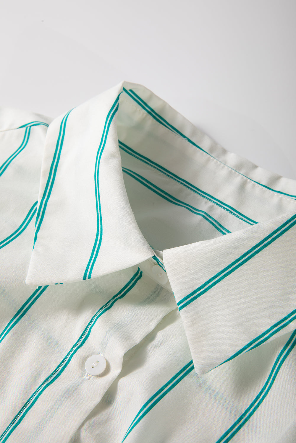 Mint green striped mini shirt dress by Modern Grace featuring wide short sleeves and a shift style, made of 100% cotton.