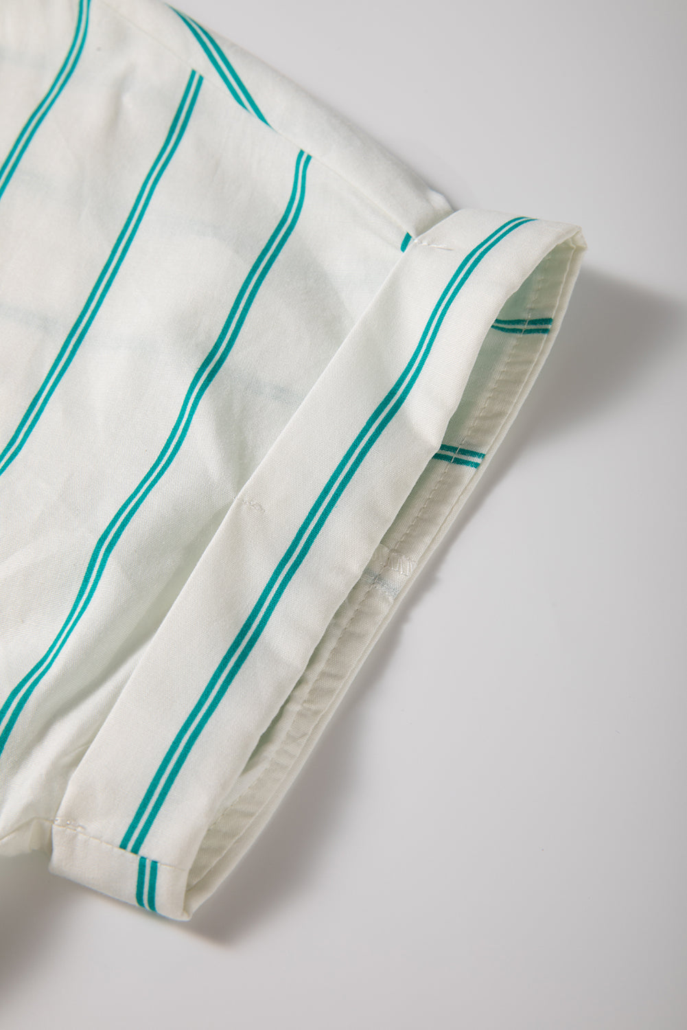 Mint green striped mini shirt dress by Modern Grace featuring wide short sleeves and a relaxed shift fit.