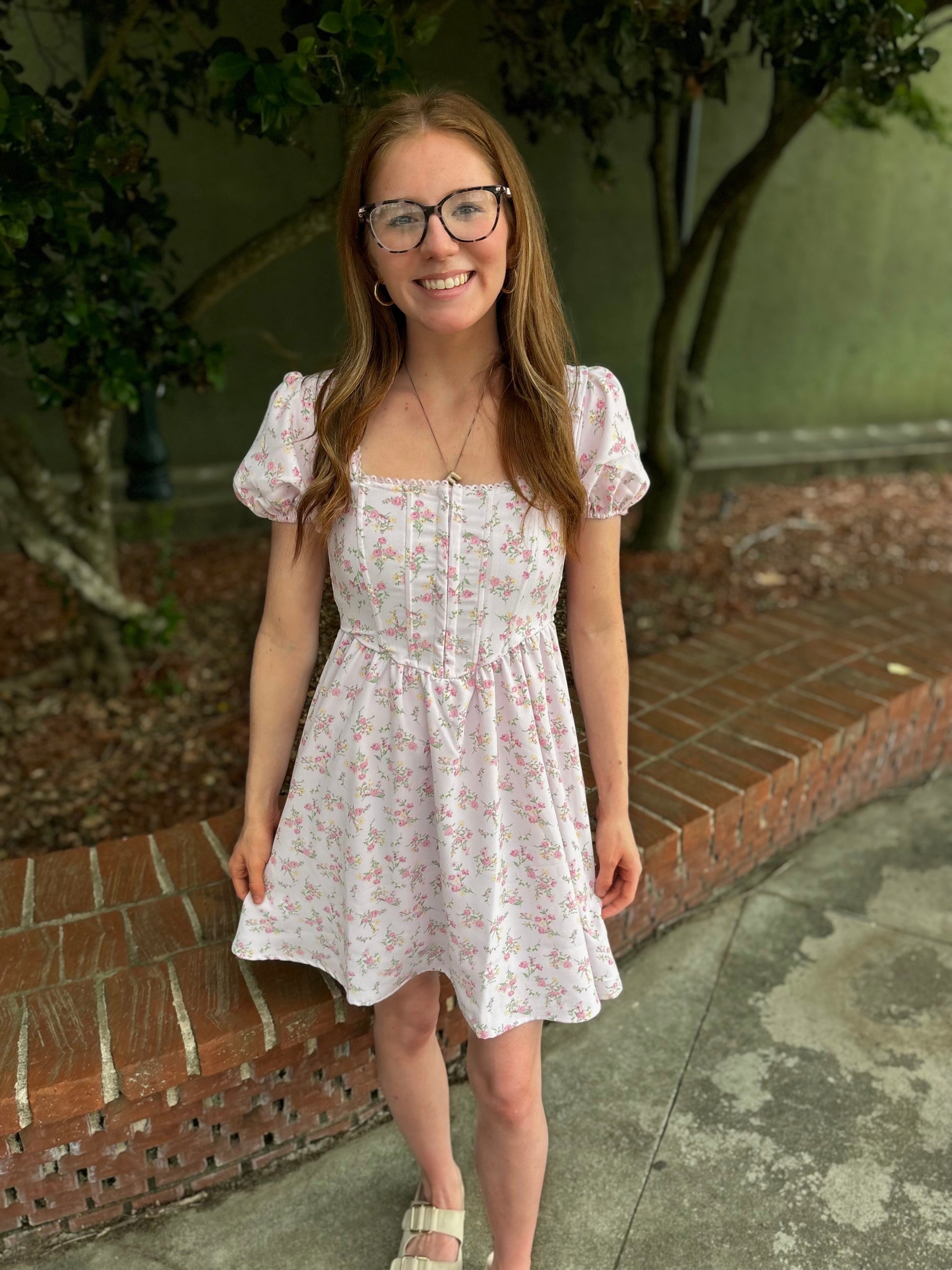 Elegant floral lace trim front hook and eye closure on Modern Grace dress, showcasing intricate lace details and feminine design.