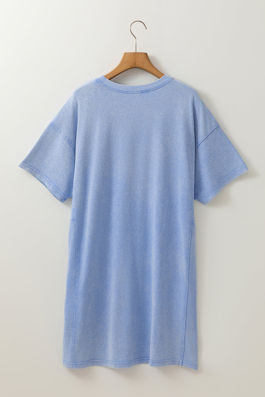 Sky blue mineral wash flower patchwork mini T-shirt dress by Modern Grace, featuring short sleeves and floral patch details.