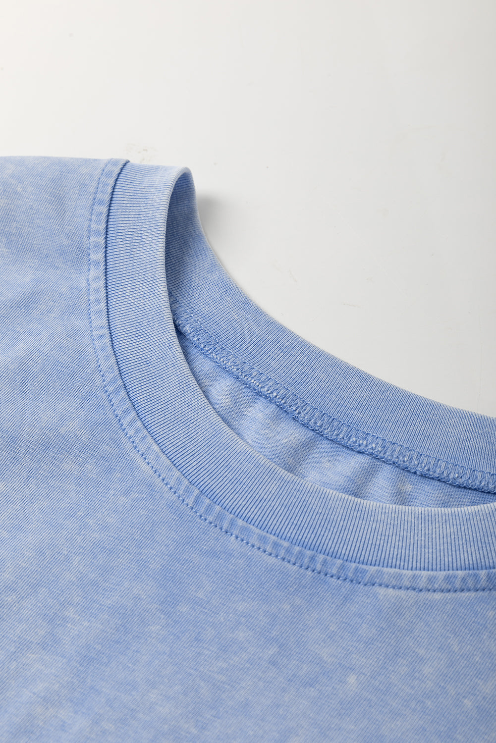 Sky blue mineral wash flower patchwork mini T-shirt dress by Modern Grace, made of 100% cotton, featuring a casual T-shirt dress style.