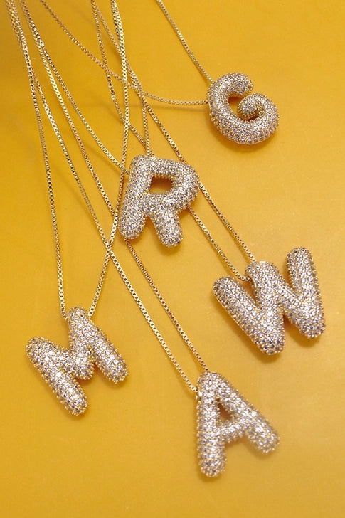 Gold pave rhinestone bubble balloon initial necklace by Modern Grace, featuring sparkling rhinestones and a delicate chain.