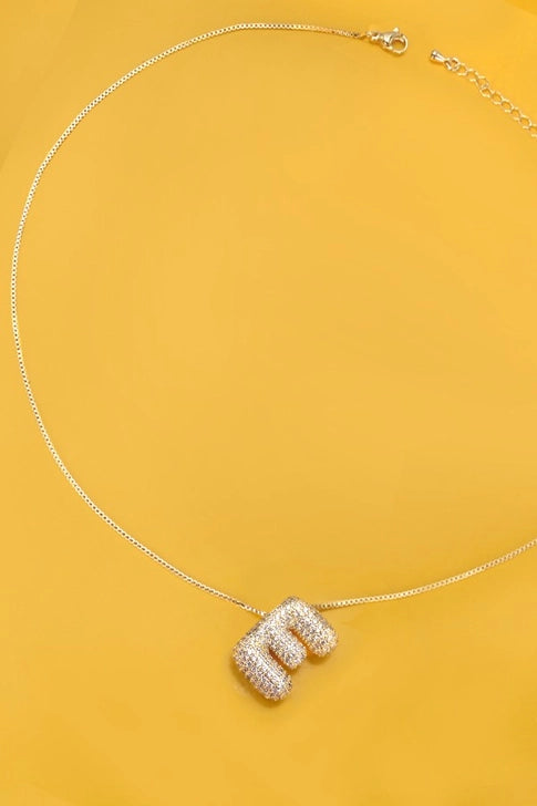 Gold pave rhinestone bubble balloon initial necklace from Modern Grace featuring sparkling rhinestones and a unique balloon-shaped pendant.