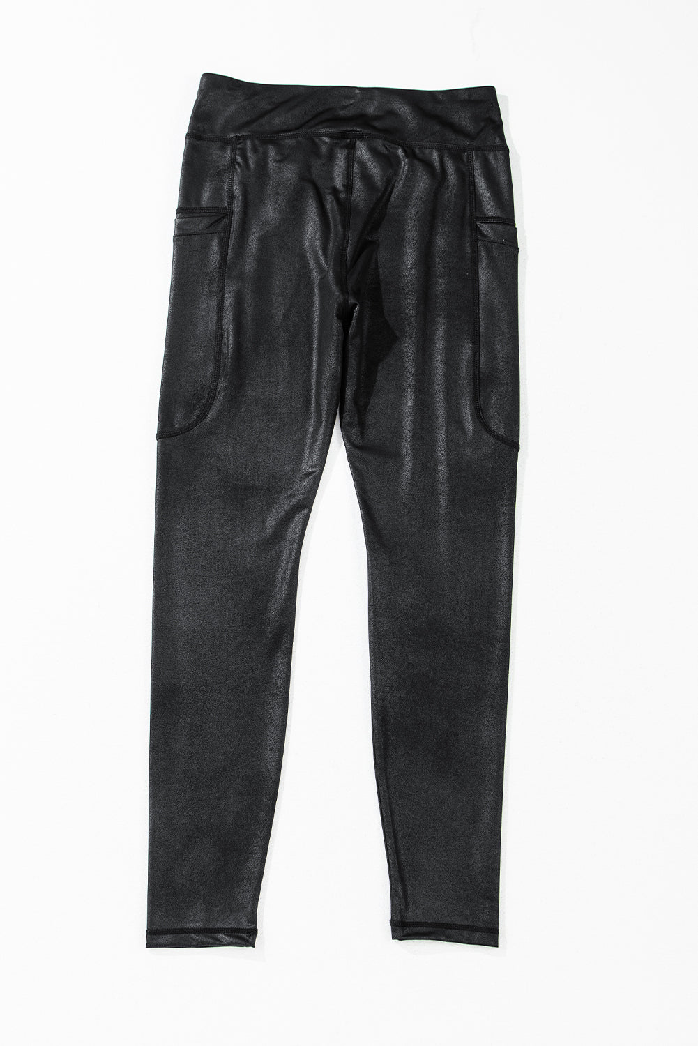 Black V crossover high waist leggings with side pockets by Modern Grace, featuring a sleek design and figure-flattering fit.