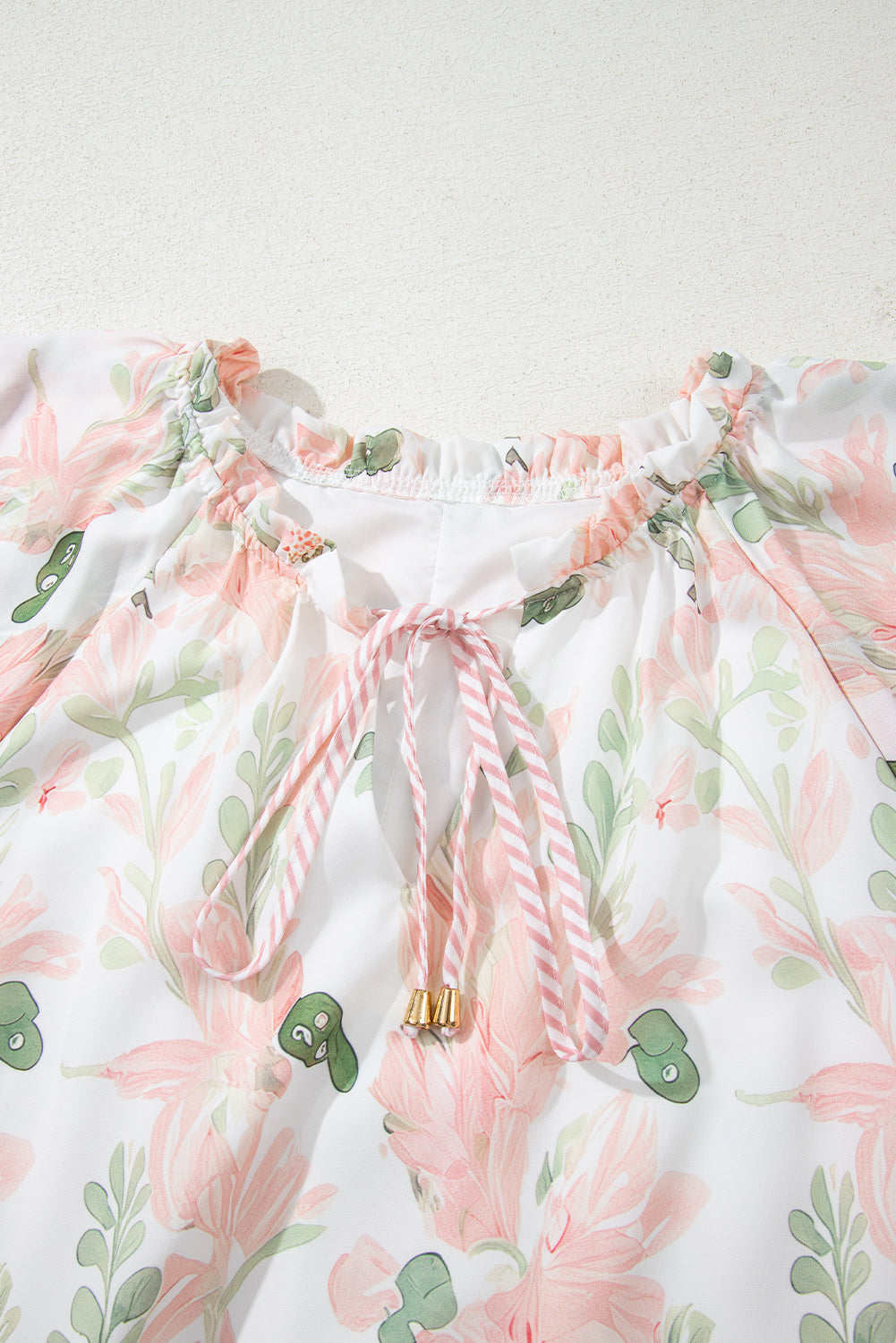 Modern Grace plus size pink summer dress with floral print and striped details, short and flowy, perfect for warm weather.