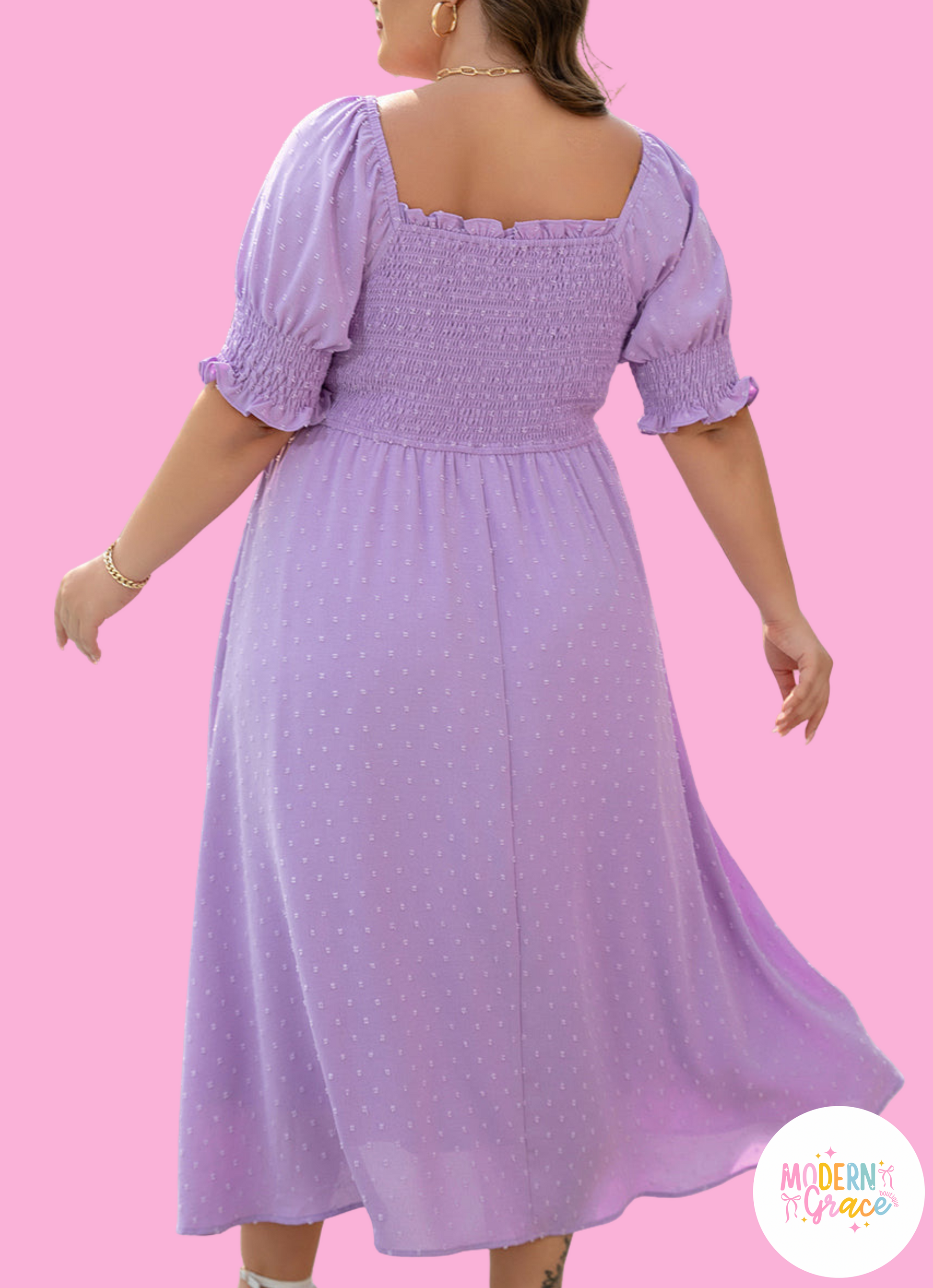 Purple Swiss Dot plus size maxi dress by Modern Grace with smocked frilled neckline and short sleeves, perfect for elegant occasions.
