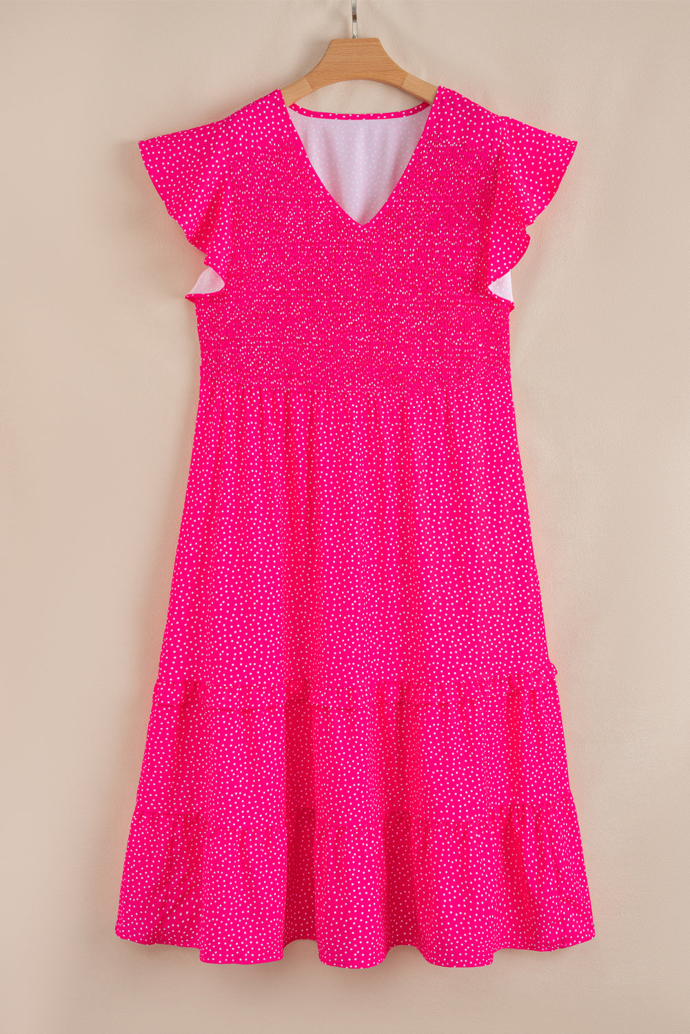 Modern Grace plus size polka dot midi dress with ruffled, smocked high waist, and flowing silhouette, featuring a playful print.
