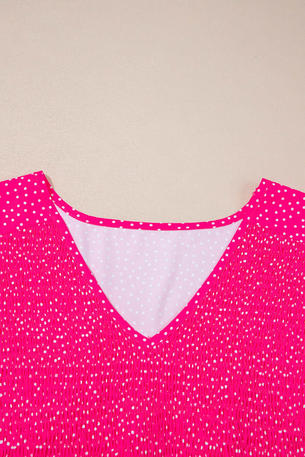 Modern Grace CurvyRose polka dot print plus size midi dress with ruffled, smocked high waist, and midi length.