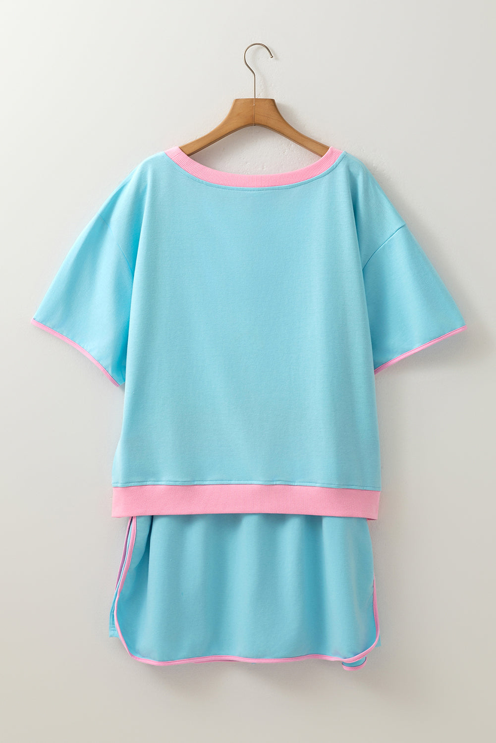 Modern Grace turquoise plus size two-piece loungewear set with contrast trim T-shirt and skirt, made of polyester, cotton, and elastane.